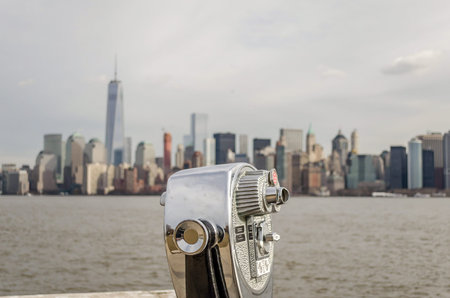 Close up Photo of Coin Operated Binoculars with View in Manhattan Cityscape, Skyscrapers and Towers,...