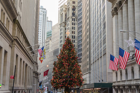 A Huge Christmas Tree Decorates Wall Street in Manhattan. Financial District Dressed in Festive Style. Lower Manhattan, New York City, USAのeditorial素材