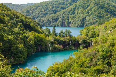 Exceptional Natural Beauty at Plitvice Lakes National Park in Croatia. Panoramic View of the Turquoise Waters, Waterfalls and Green Trees.の写真素材