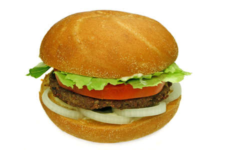 homestyle beef burger with onion rings, tomato and lettuce, ready to eatの写真素材