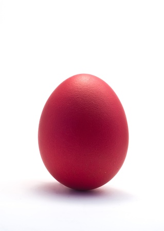 red easter egg isolated on whiteの写真素材