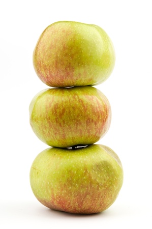 stack of three apples over white backgroundの写真素材