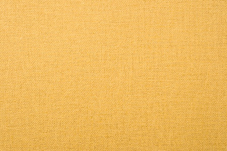 canvas texture wallpaper. golden textured background.の写真素材