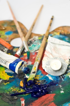 artist's palette with colorful paint and brushes.の写真素材