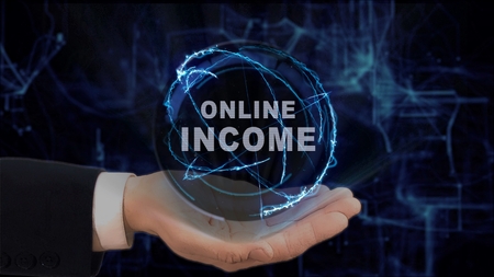 Painted hand shows concept hologram Online income on his hand. Drawn man in business suit with future technology screen and modern cosmic backgroundの写真素材