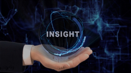 Painted hand shows concept hologram Insight on his hand. Drawn man in business suit with future technology screen and modern cosmic backgroundの写真素材