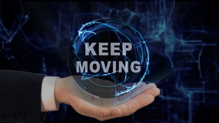 Painted hand shows concept hologram Keep moving on his hand. Drawn man in business suit with future technology screen and modern cosmic backgroundの写真素材