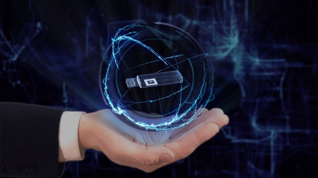 Painted hand shows concept hologram 3d USB stick on his hand. Drawn man in business suit with future technology screen and modern cosmic backgroundの写真素材