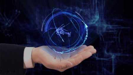Painted hand shows concept hologram 3d helicopter on his hand. Drawn man in business suit with future technology screen and modern cosmic backgroundの写真素材