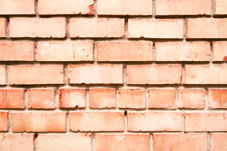 Abstract weathered texture stained old stucco light gray aged brick wall background in rural room,...