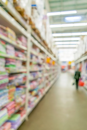 Shelves with goods in a supermarket. The interior of the store.の写真素材