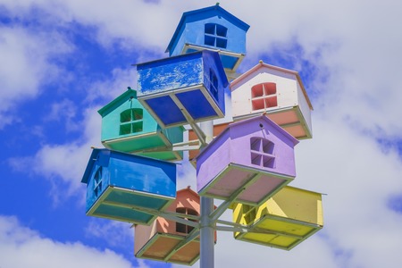 Beautiful bird houses against the blue skyの写真素材