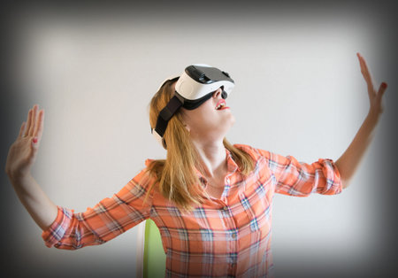 Young girl in a virtual reality headset. For modern design projects.