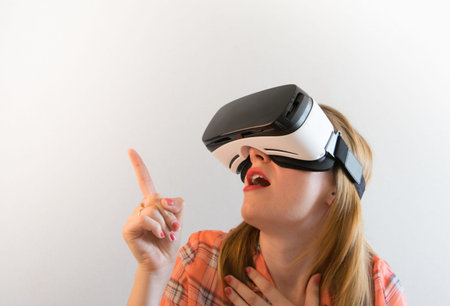 Young girl in a virtual reality headset. For modern design projects.