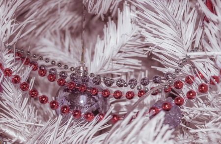 Christmas background for greeting card. Decorated fir tree in the room in the New Year's holiday.の写真素材