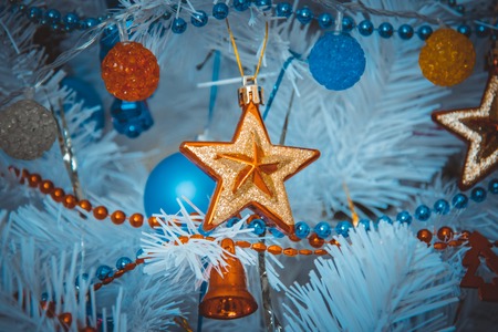 Christmas background for greeting card. Decorated fir tree in the room in the New Year's holiday.の写真素材