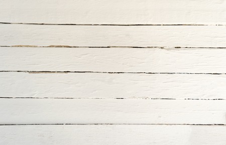 Background of weathered painted white wooden plankの写真素材