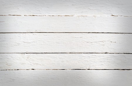 Background of weathered painted white wooden plankの写真素材