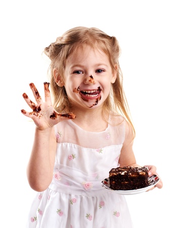emotional portrait of a little girl with cakeの写真素材