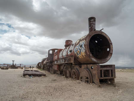 Vintage rusty train at the Train Cemetery in Uyuni desert, Bolivia, South Americaの写真素材
