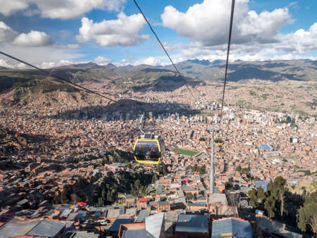 With the cable railway over the roofs in la paz, boliviaの写真素材