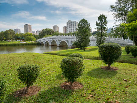 The bridge connecting the Chinese Garden and Japanese Garden islands, Singaporeの写真素材