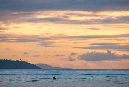 Water Sunset Background. Clear Tropical Island View and Sunset Beach Backgroundの写真素材