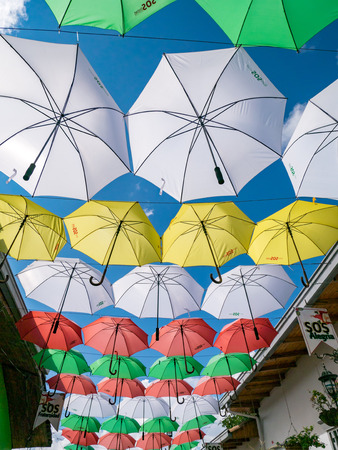 Umbrellas suspended on the streets of Guatape Colombiaのeditorial素材