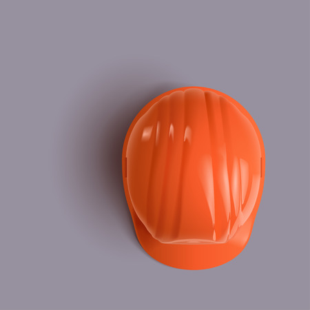 illustration of realistic orange construction helmet lying on grey backgroundのイラスト素材