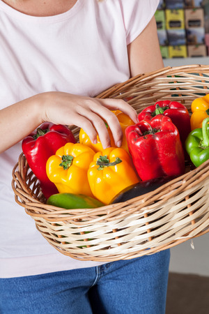 Woman holding a vegetablesの写真素材