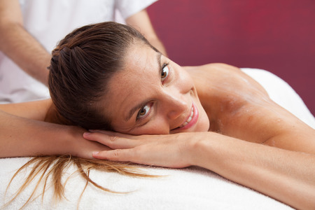 Woman receiving a massageの写真素材