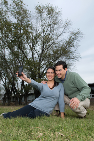 Couple taking a photoの写真素材