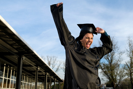 Happy student celebratingの写真素材