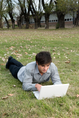 Young man using the computerの写真素材