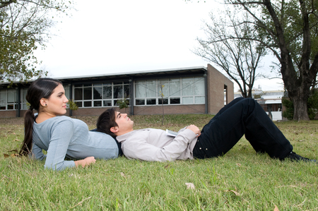 Couple taking a rest outsideの写真素材