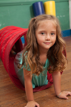 Girl playing in kindergardenの写真素材