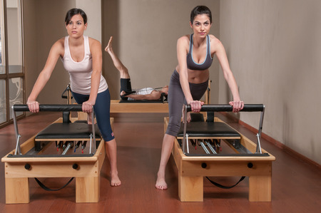 Two woman doing pilatesの写真素材