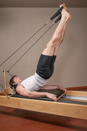 Man doing pilatesの写真素材