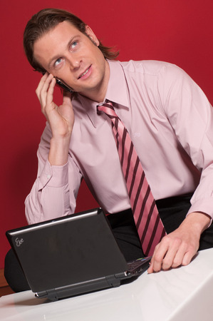 Business man talking by phoneの写真素材