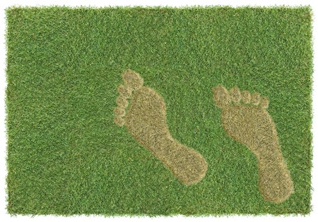 footprint on a piece of grass, environmental damageの写真素材
