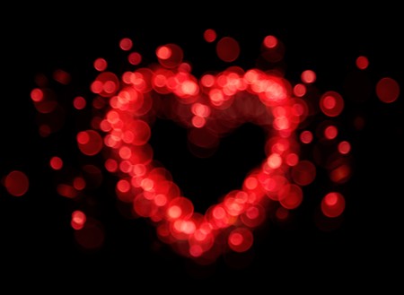 heart shape form by red bokeh lightsの写真素材