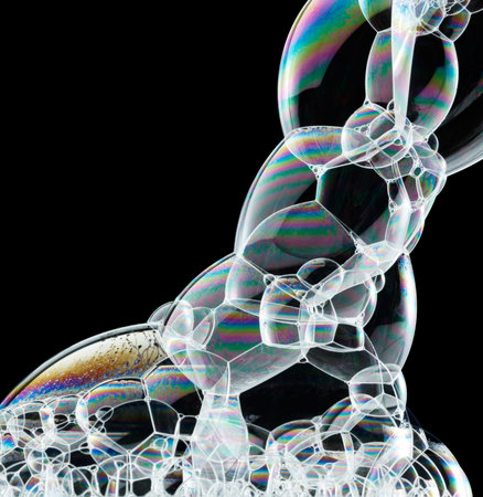 bubbles in abstract shape against black background
