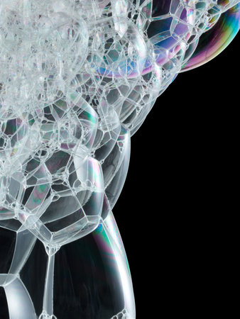 bubbles in abstract shape against black background