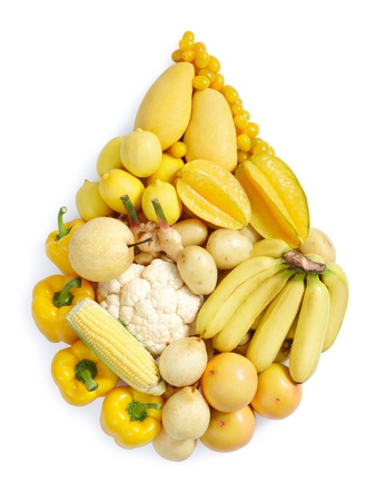 yellow fruits and vegetables in water drop shapeの写真素材