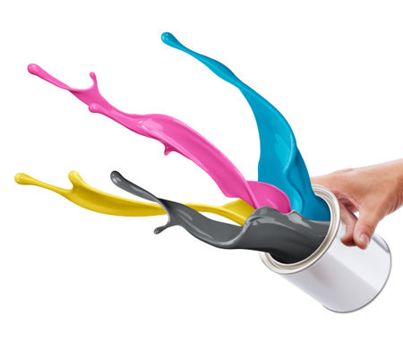 pouring paint consisting CMYK colors from its bucket creating splash
