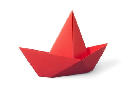 origami red paper boat isolated on white backgroundの写真素材