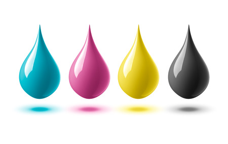 drops of paint or ink in cmyk colorsの写真素材