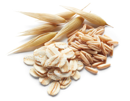 processed, unprocessed and crops of oat isolated on whiteの写真素材