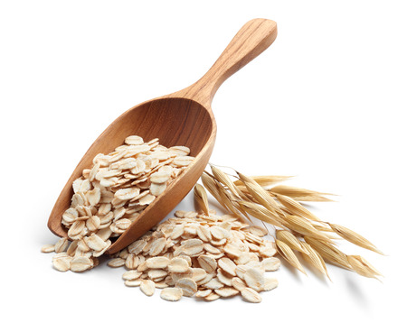 scoop and pile of oatmeal with its plantの写真素材