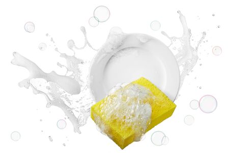 water containing soap splashing on plate with spongeの写真素材